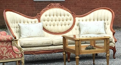 The white tufted damask victorian sofa, makes a beautiful rental sofa in a lounge area. The name of the rental sofa is the Anastasia Sofa.