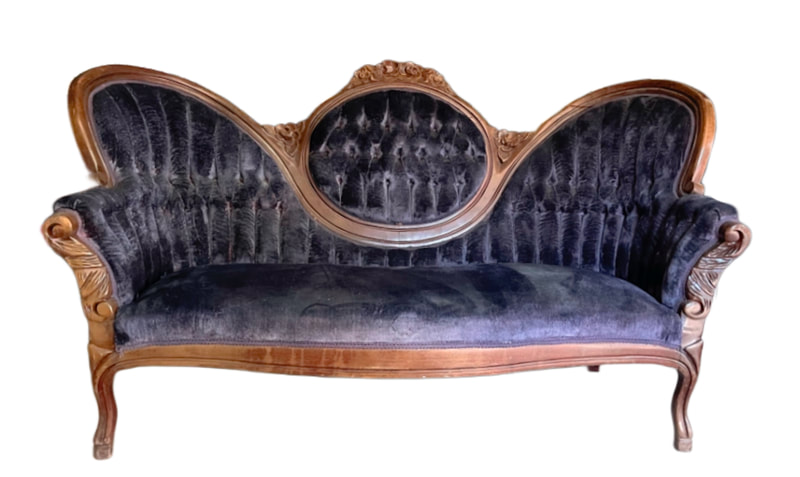 A deep purple Victorian couch rental will add passion to your lounge area.