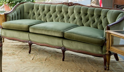 The Forest Sofa is our best rental sofa to use in a wedding lounge area. The forest green color works with most weddings, especially fall weddings.