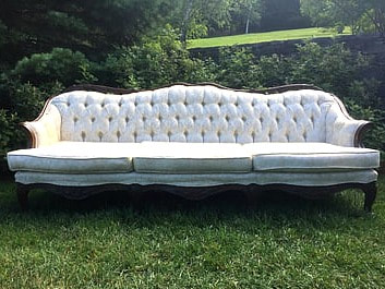 The white tufted victorian sofa is simple and elegant to rent for ant occasion.